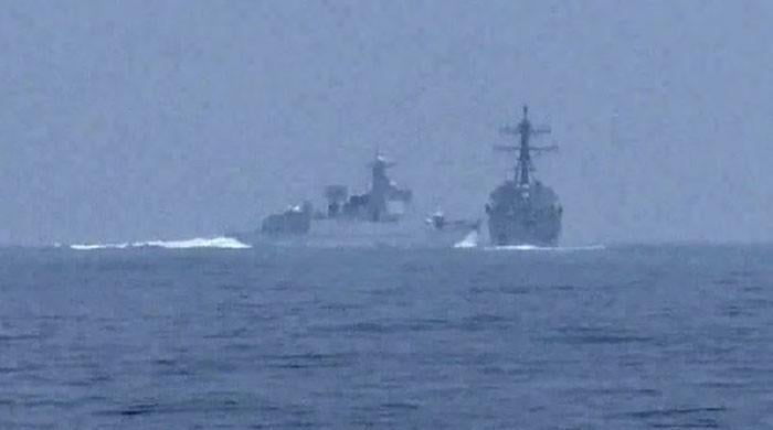 China accuses US of provocation after warships nearly collide