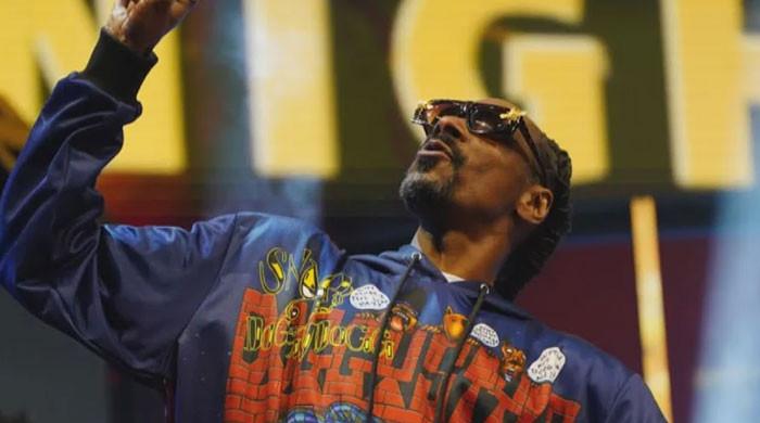 Snoop Dogg delays concerts to back writers strike