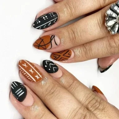 black and brown nail art 384x384 1