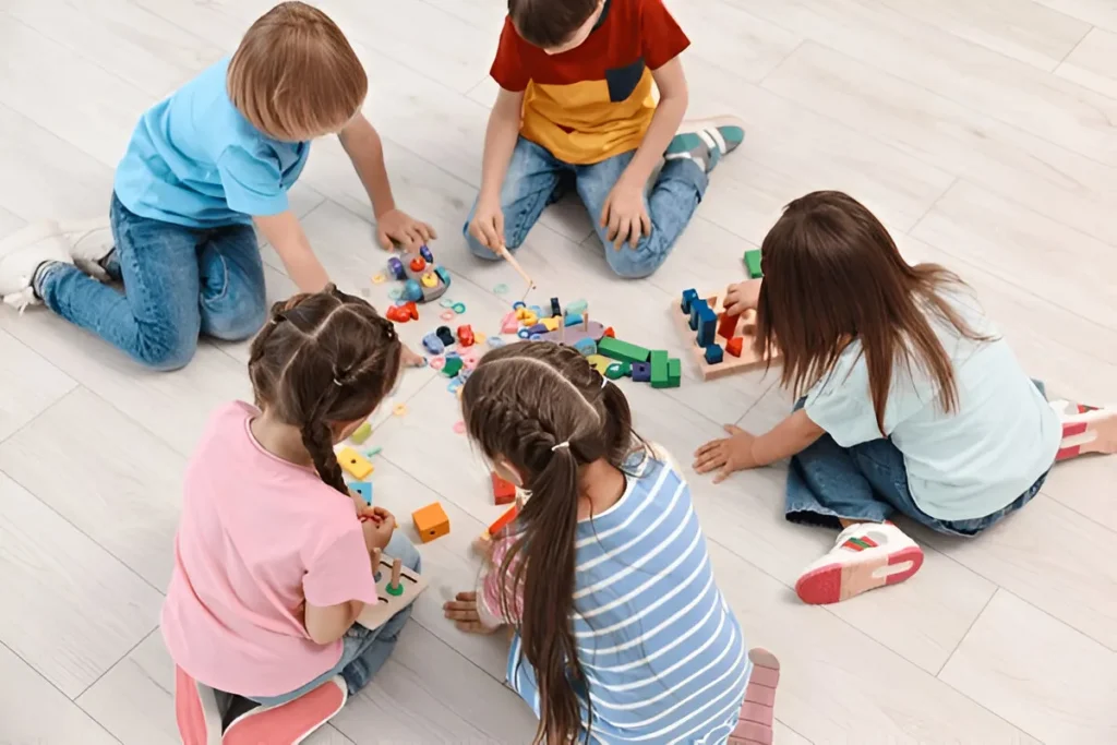 Choosing the Right Preschool: Why St Ives Preschool Stands Out group children playing together on floor